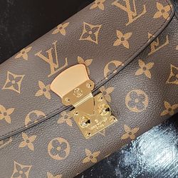 Louis Vuitton pink clutch wallet