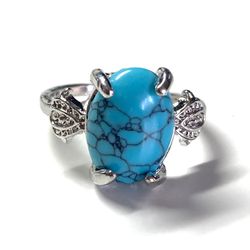 100-1 Turquoise Oval Ring Size 5