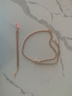 Rose gold ribbed necklace and bracelet