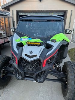 Bent metal windshield with automatic wiper