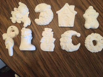 38 paintable plastic Christmas ornaments.