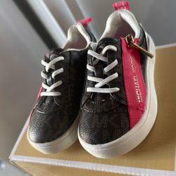 5C These are Michael Kors Girls Brown Logo Trainers