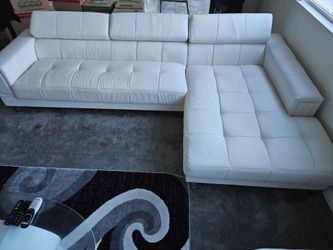 L shaped sofa and ottoman