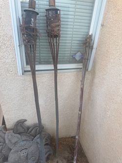 3 tiki torches 5.00 for all