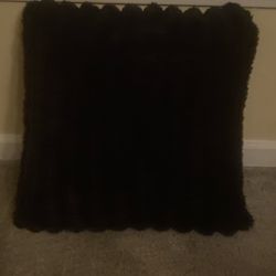 Black fluffy pillow