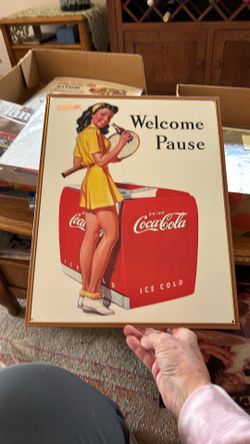 Coca cold metal sign. Welcome pause