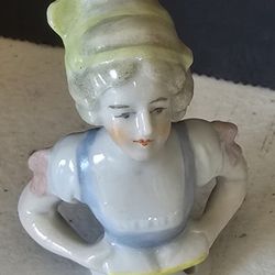 VTG 2.5" half doll / pincushion doll. Blue/white dress, Holding a book 