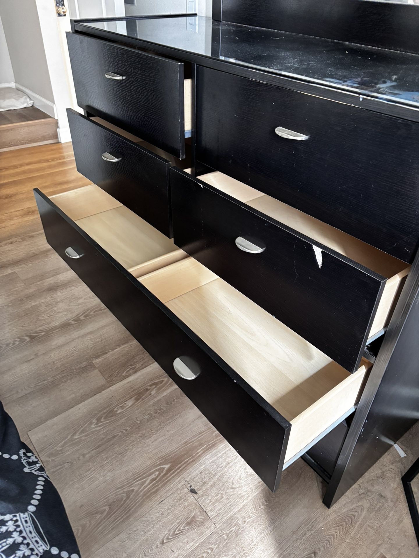 black dresser with mirror