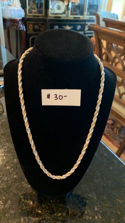Brilliant 20 inch silver tone necklace with interwoven gold chain.