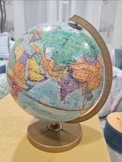 Great condition vintage Replogle 12" Traveler Globe, some glue at middle but turns smooth, map in tact.