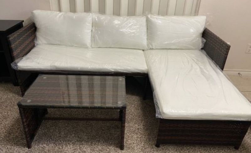 BRAND NEW OUTDOOR PATIO FURNITURE SECTIONAL AND TABLE SET