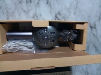 Brand new karaoke microphone (Built in speaker) ( lights up )