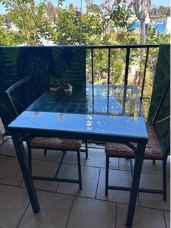 Glass Table with 2 wicker Chairs