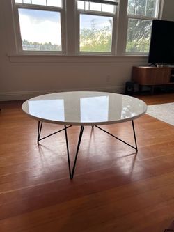 Modern round white coffee table