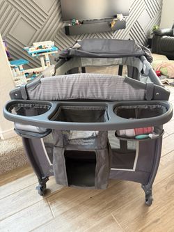 Baby Trend Lil’ Snooze™ Deluxe III Nursery Center Playard for Twins, Cozy Grey