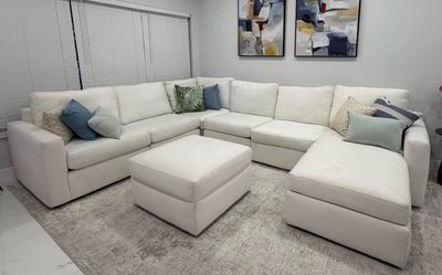 Large Beige sectional couch with storage ottoman