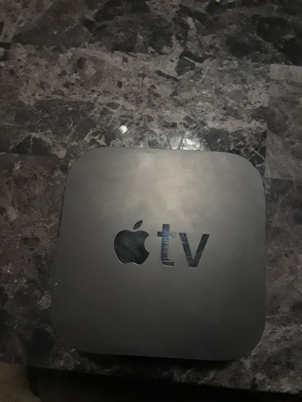 Apple tv w/ remote,power cord, and hdmi cord