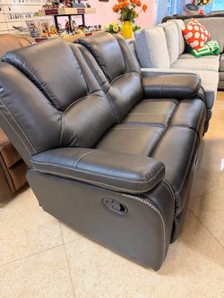 New open box love seat with manual recliner