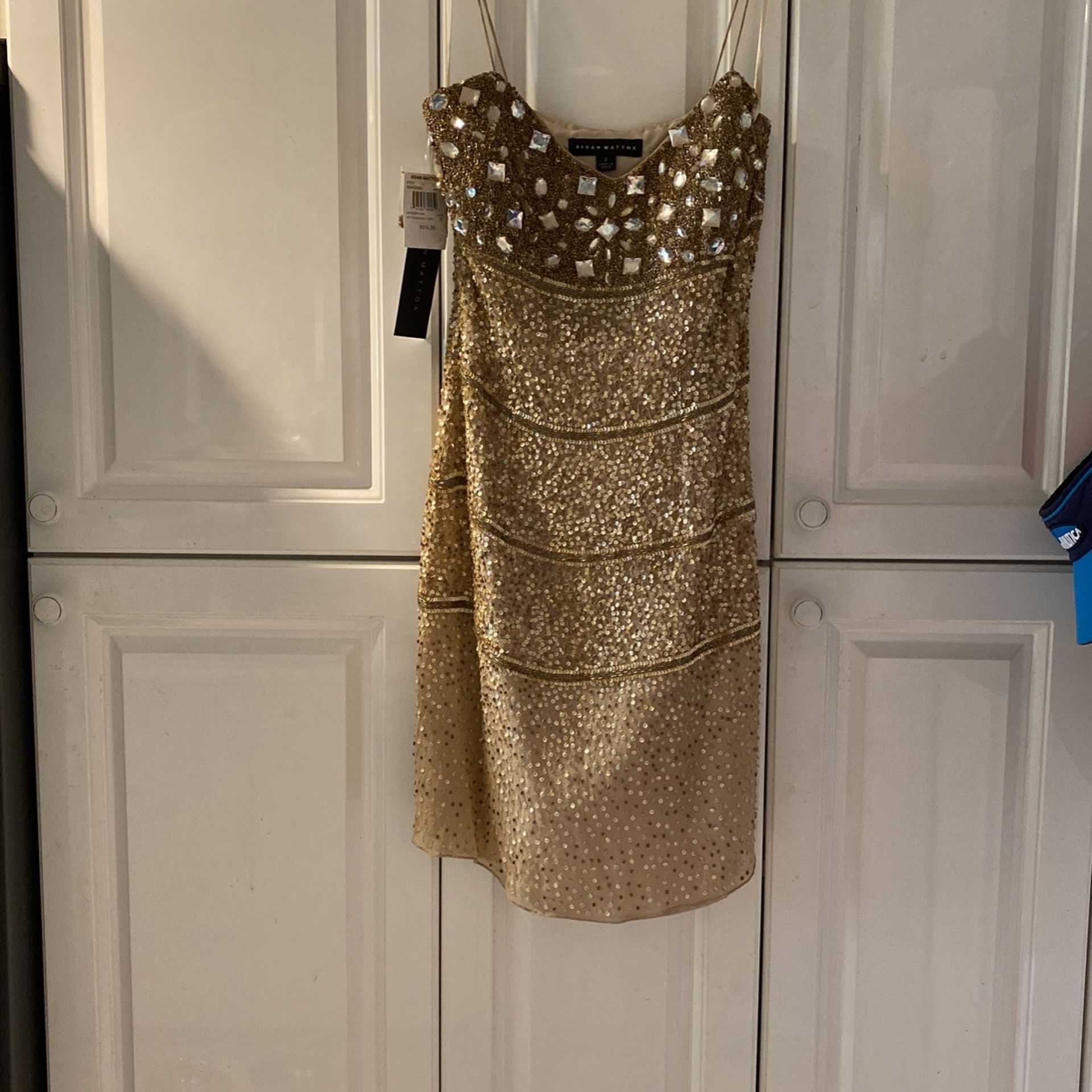 STUNNING GOLD ASSORTED CLEAR STONES AND CHAMPAGNE AND GOLD SEQUINS PARTY DRESS