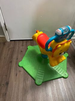 Fisher price bounce & spin lion toddler ride on