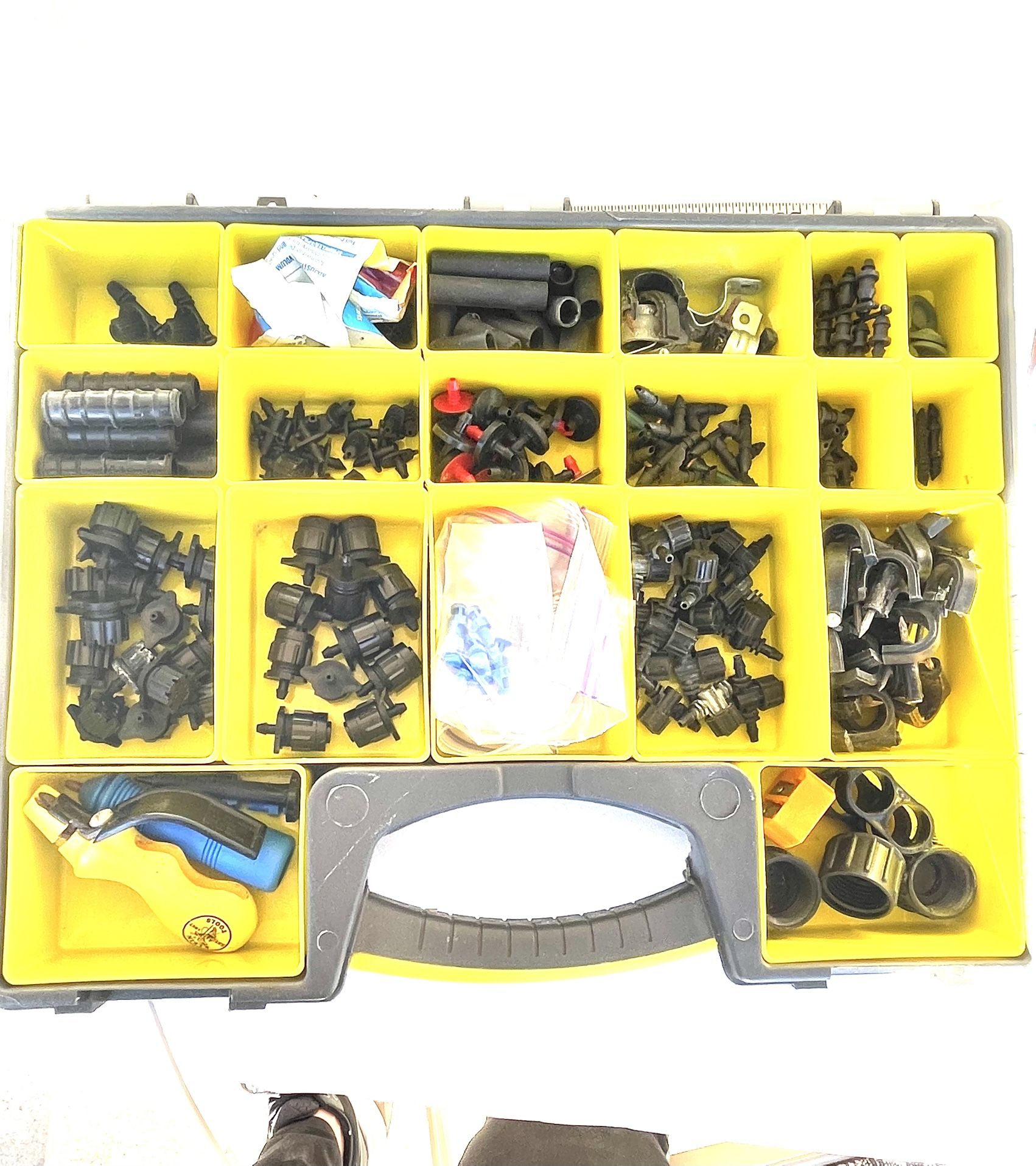 Utility Box Full Of Rubber Sprinkler Parts
