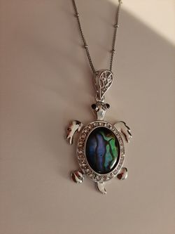 Sea turtle necklace.