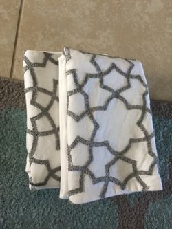 2 white and silver pillow case