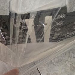 Brand NEW NEVER BEEN USED BLACK AND GREY AUTHENTIC MK BAG