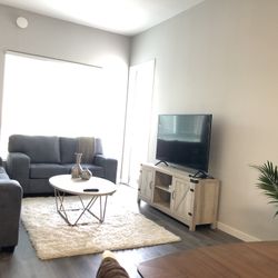 TV cabinet, coffee table, 2 round table lamps.