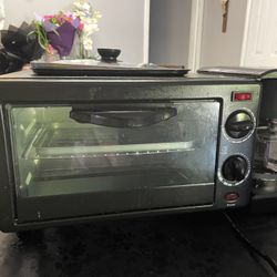 Toaster oven with coffee maker