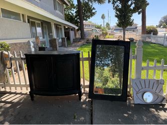 Dark brown dresser and mirror
