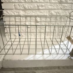 Sturdy metal wire basket with attached bell. 22" ×12"x8"