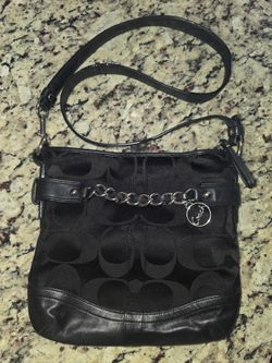 COACH black crossbody purs.