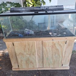 Fish Tank.  Unfinished Wood Stand. 48" Wide. 17 1/4  Tall. 15" Deep. Stand Is 32" Tall