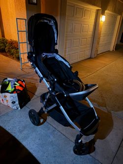 Mocking bird double stroller and car seat base