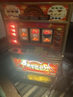 VINTAGE AZTECA SLOT MACHINE