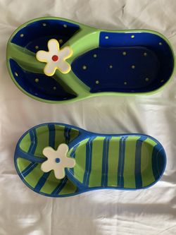 2 serving bowls the yellow flower bowl 16 by 7 and the the green flower 14 by 6 ceramic bowls