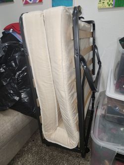Twin roll away bed