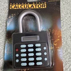 Padlock Style Calculator. Model CPS – 30913 Battery Operated, Eight Digit Display, Square Root Key.