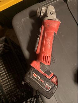 Milwaukee grinder, battery