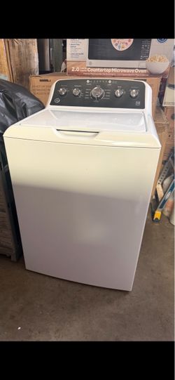 Top load washer GE agitator white w 27”