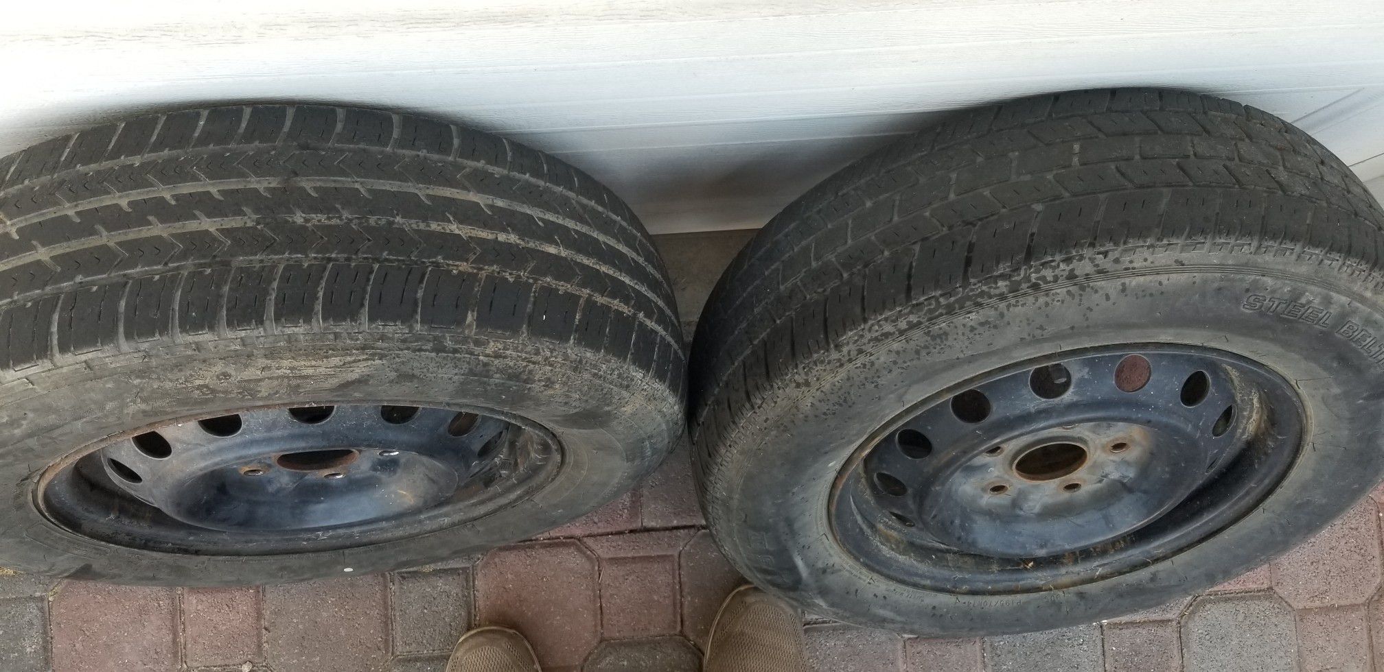 2 trailer wheels and tires
