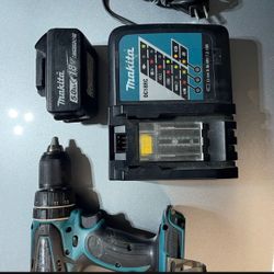 Makita 18v  Hammer Drill with  Charger and  18v  5 Amp Battery 