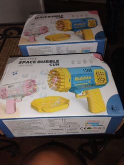 Space bubble gun I have two boxes each box has to a blue one and a pink one each box