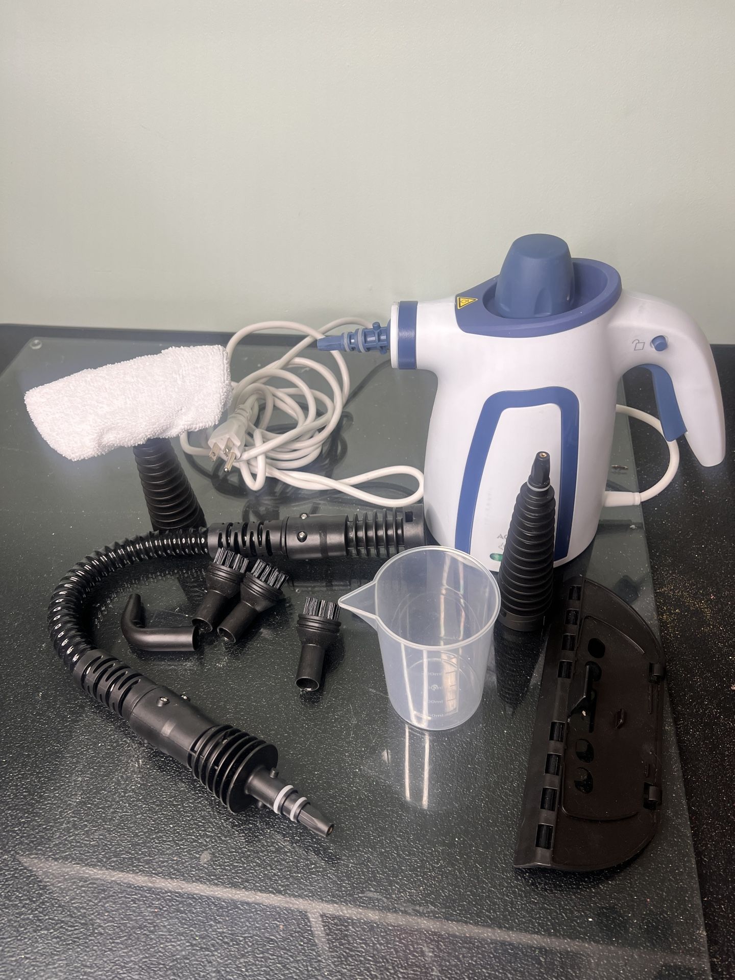Hand-held Steam Cleaner