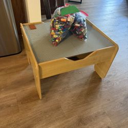 KidKraft wooden activity table with a reversible top