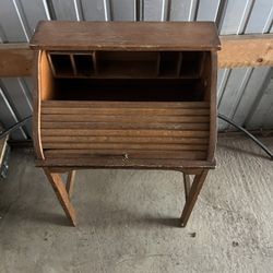 Two children’s rockers One roll top desk child