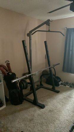 Bench squat rack cable pull down bar and some weights