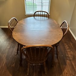 FREE BROWN WOOD TABLE SEATS 4