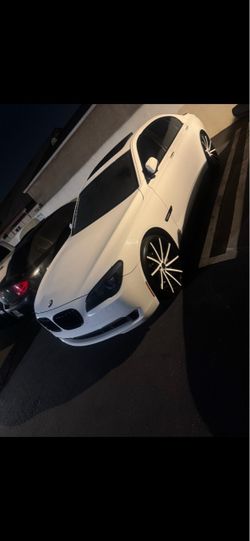 BMW Sedan White with Custom Wheels